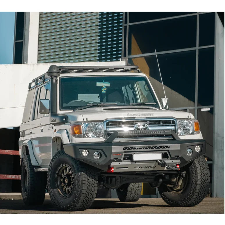 White toyota land cruiser fitted with rockarmor gt steel hoopless bullbar and bash plate for off-road protection