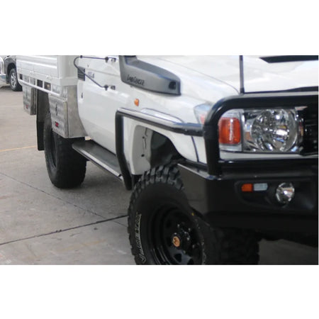 White utility truck featuring black bull bar and rockarmor steel rockslider side steps with steel checker plate for toyota landcruiser suit