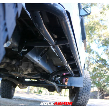 Black rockarmor steel rockslider side steps in steel checker plate fitted on rear of toyota landcruiser 78 series v8 troop carrier